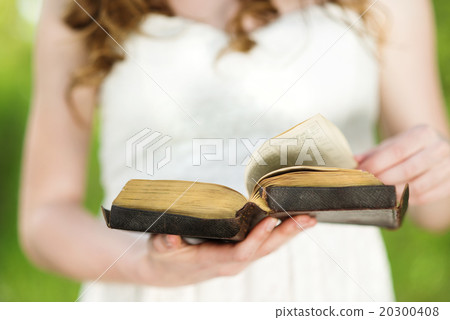 Beautiful woman with Bible Beautiful woman with Bible 20300408