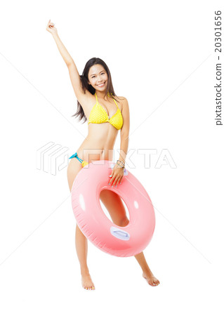 sexy female in bikini holding swimming ring sexy female in bikini holding swimming ring 20301656