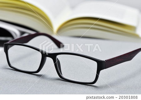 eyeglasses and open book 20301808