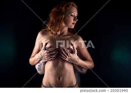 Touching mans chest woman Top Signs