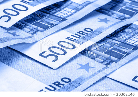 Several 500 euro banknotes and coins are adjacent. Several 500 euro banknotes and coins are adjacent. 20302146
