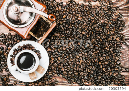 cup of warm coffee and coffee grinder cup of warm coffee and coffee grinder 20303594