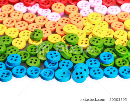 Mixed coloured bright buttons isolated Mixed coloured bright buttons isolated 20303595