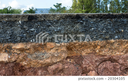 The curb erosion from storms. 20304105