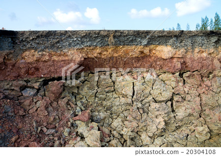 The curb erosion from storms. 20304108