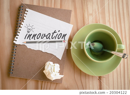 Notebook with text Innovation on table Notebook with text Innovation on table 20304122