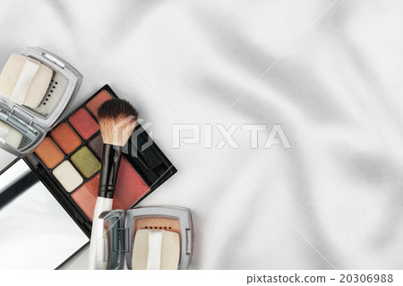 Beautiful picture of cosmetic on white silk 20306988