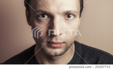 Young Caucasian man, close-up studio portrait Young Caucasian man, close-up studio portrait 20307733