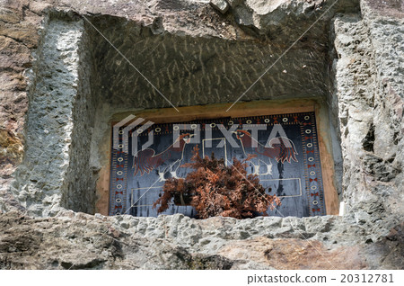 Traditional cave grave carved in the rock at Lemo Traditional cave grave carved in the rock at Lemo 20312781