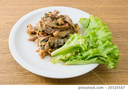 Spicy Grilled Beef Salad on A Wooden Table Spicy Grilled Beef Salad on A Wooden Table 20320587