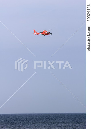 American Coast Guard Flying over the Gulf of Mexico HH-65 Dolphin Search and Rescue Helicopter American Coast Guard Flying over the Gulf of Mexico HH-65 Dolphin Search and Rescue Helicopter 20324198