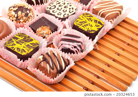 chocolate sweets on the bamboo mat chocolate sweets on the bamboo mat 20324653