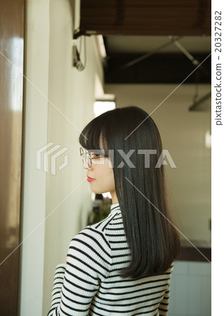 Looking back at the black hair long Looking back at the black hair long 20327282