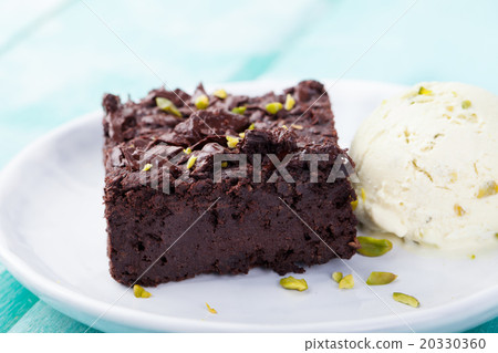 Chocolate brownie, cake on a white plate Chocolate brownie, cake on a white plate 20330360