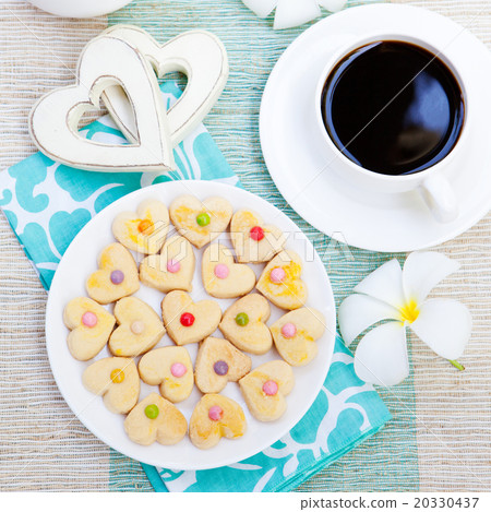 Romantic breakfast: coffee, heart shaped cookies 20330437