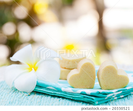 Handmade heart shape cookies on blue napkin Handmade heart shape cookies on blue napkin 20330521