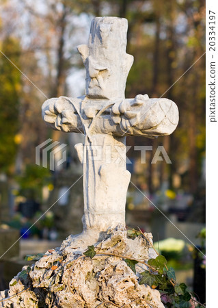 Cross with crucified Jesus Christ at cemetery 20334197