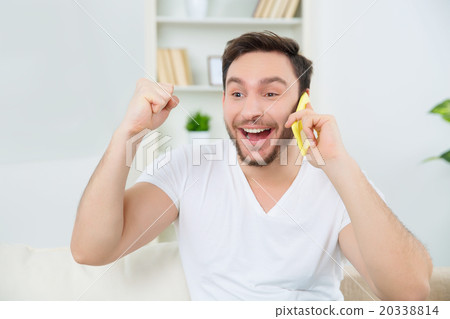 Cheerful man is ready to celebrate the good news. Cheerful man is ready to celebrate the good news. 20338814