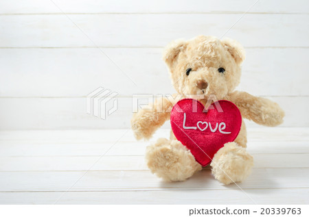 Brown Teddy Bear holding red heart Brown Teddy Bear holding red heart 20339763