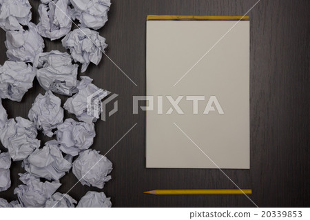 Crumpled paper balls and blank sheet of paper with Crumpled paper balls and blank sheet of paper with 20339853