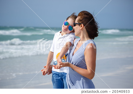 Mother and son on tropical beach in Florida 20340933
