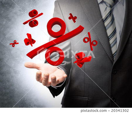 Businessman holding percentage sign Businessman holding percentage sign 20341302