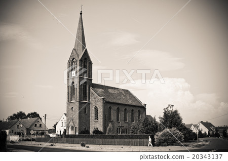 Gothic church with the clock on the tower Gothic church with the clock on the tower 20343137