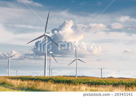 Wind turbine farm on rural terrain Wind turbine farm on rural terrain 20343141