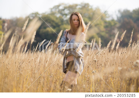 beauty girl with long red blowing hair outdoors. beauty girl with long red blowing hair outdoors. 20353285