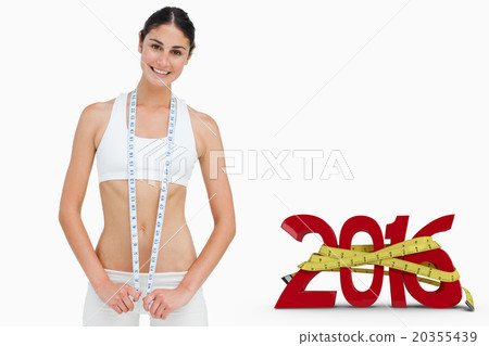 Composite image of slim woman with a measure tape Composite image of slim woman with a measure tape 20355439