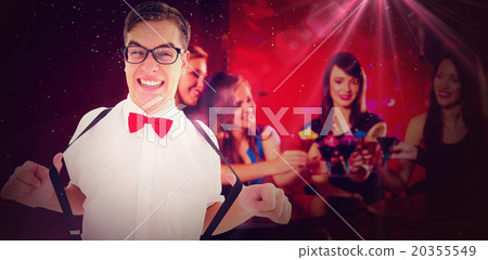 Composite image of geeky hipster pulling his suspenders Composite image of geeky hipster pulling his suspenders 20355549
