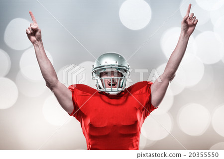Composite image of american football player with arms raised sta Composite image of american football player with arms raised sta 20355550