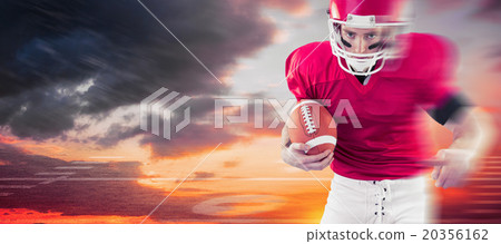 Composite image of portrait of focused american football player 20356162