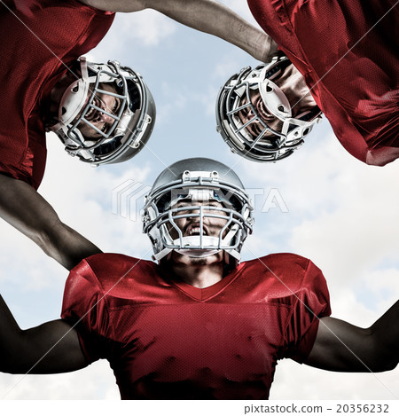 Composite image of american football huddle 20356232