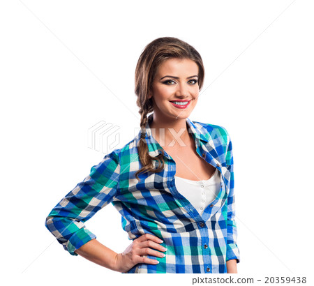 Woman with plait in blue and green checked shirt Woman with plait in blue and green checked shirt 20359438