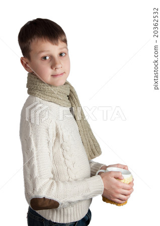Cute boy with a cup isolated on white background Cute boy with a cup isolated on white background 20362532