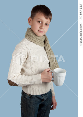 Cute boy with a white cup on blue background 20362538