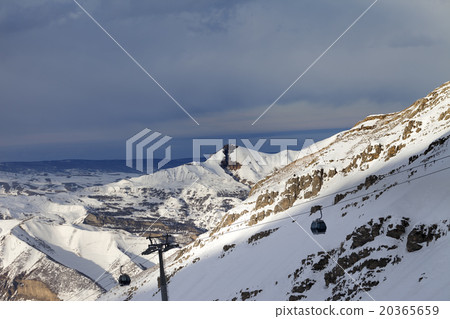 Gondola lift on ski resort at sun evening 20365659