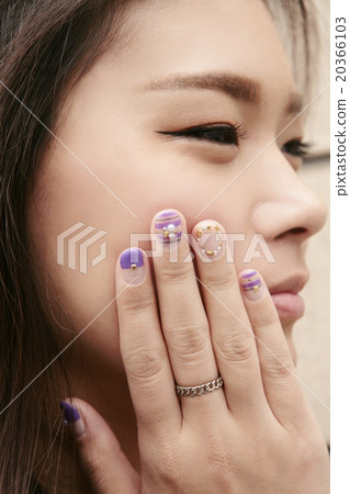 Women's hands and purses with purple nails Women's hands and purses with purple nails 20366103