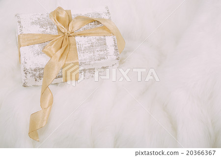 Shabby chic gift with ribbon on white background Shabby chic gift with ribbon on white background 20366367