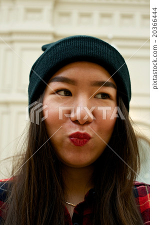 Portrait of a girl making kiss 20366444