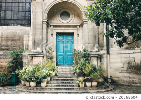 Old Turquoise Door with Stairs and Flower Pots 20368604