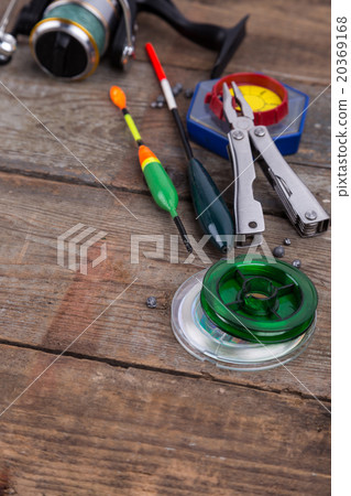 fishing tackles for anglers on wooden background fishing tackles for anglers on wooden background 20369168
