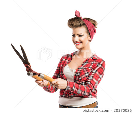 Woman with pin-up make-up and hairstyle holding Woman with pin-up make-up and hairstyle holding 20370026