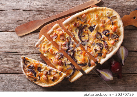 sliced pie flammkuchen on the table sliced pie flammkuchen on the table 20370759