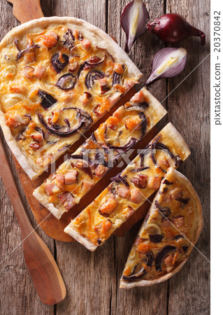 sliced pie flammkuchen close-up on the table sliced pie flammkuchen close-up on the table 20370842