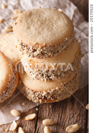 Alfajores cookies on paper on the table macro Alfajores cookies on paper on the table macro 20370928