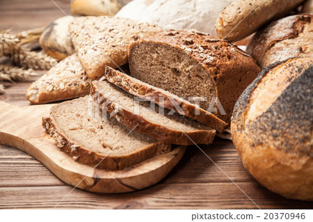 Bread assortment on wooden surface Bread assortment on wooden surface 20370946