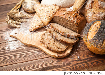 Bread assortment on wooden surface 20370952