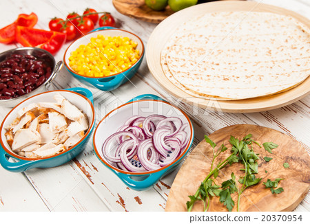Tortilla with a mix of ingredients 20370954
